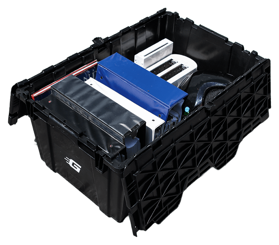 An open Ghatt2Go bin packed with binders, a toaster, and household items